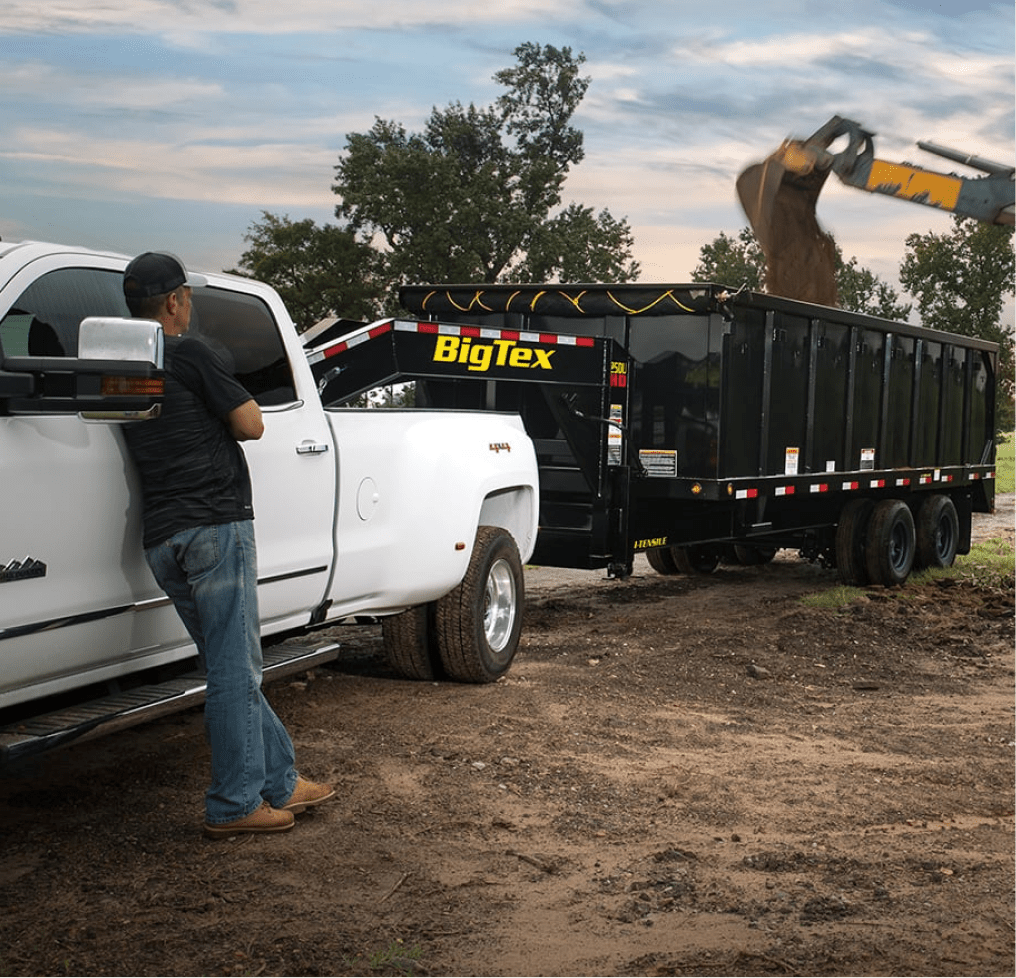 Man With White Truck and Big Tex Trailer