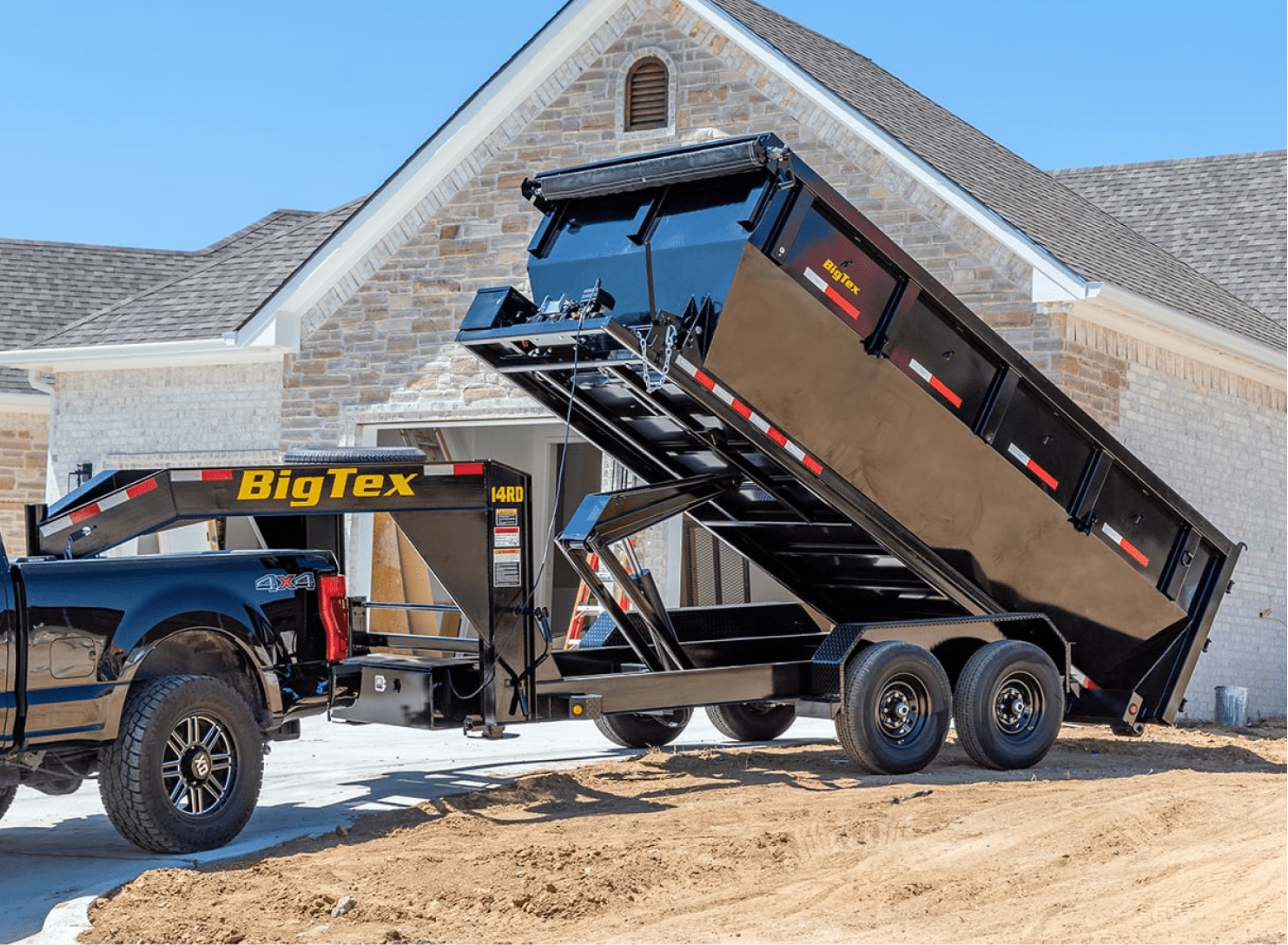 Big Tex Dump Trailer in Front of House