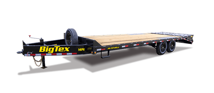 a 14PH big tex hydraulic dovetail gooseneck trailer with a wooden deck