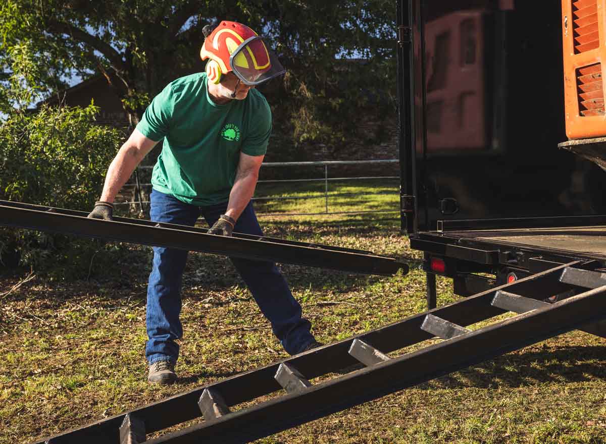 Man Adding Ramps to Trailer