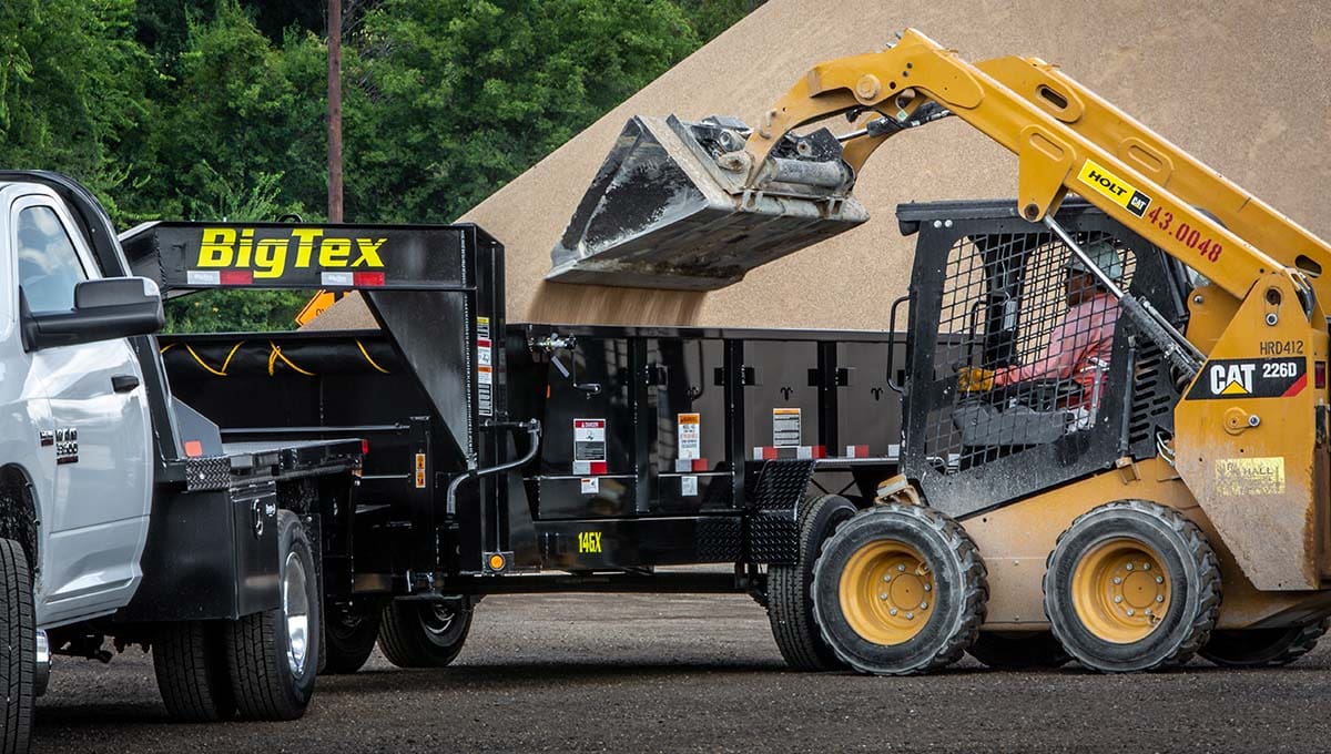 a truck with a 14gx big tex trailer attached to it