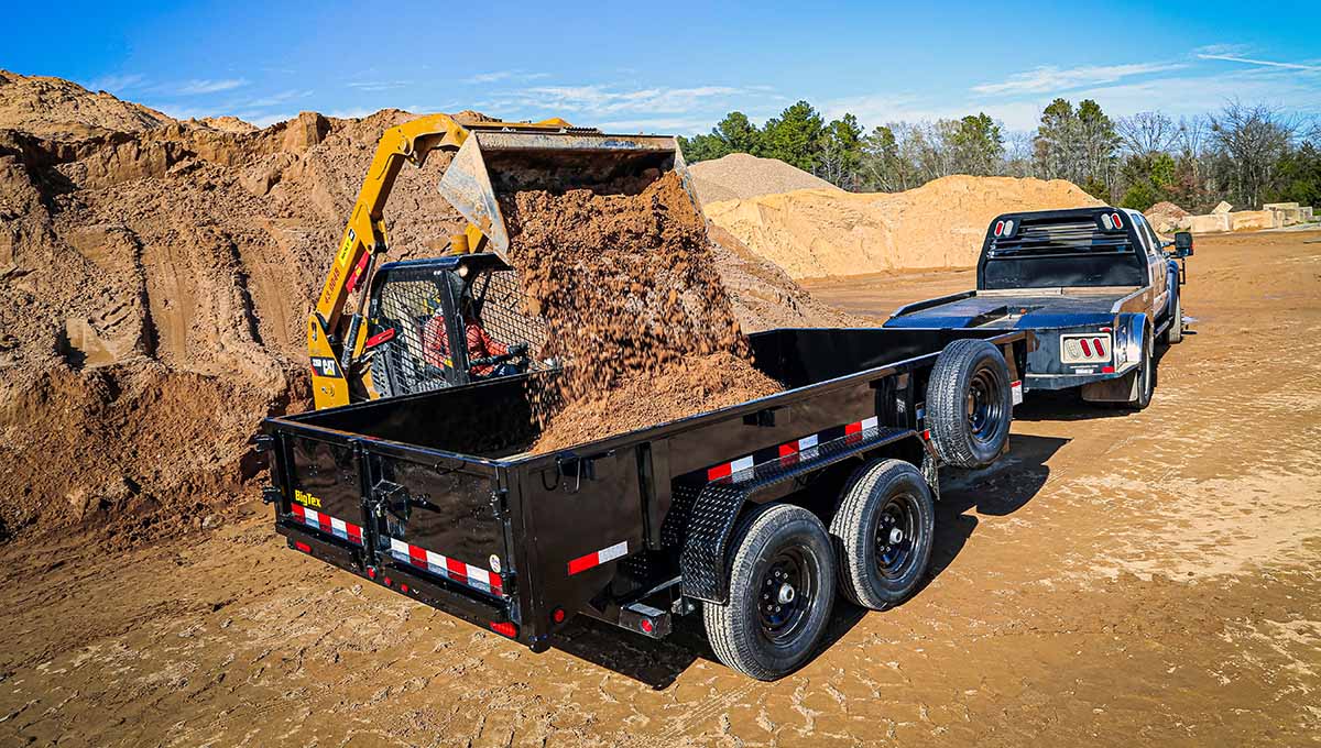 a 14ld commercial grade dump trailer full of dirt
