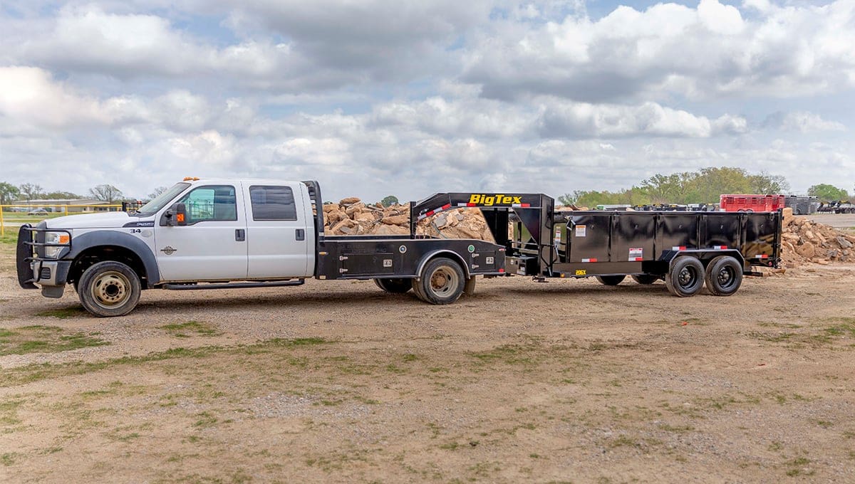 a truck with a 20gx big tex trailer attached to it