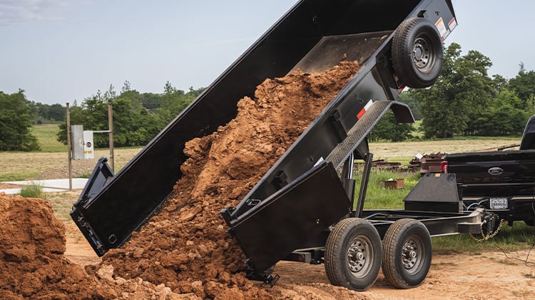 Commercial Grade Dump Trailer Hauling Dirt