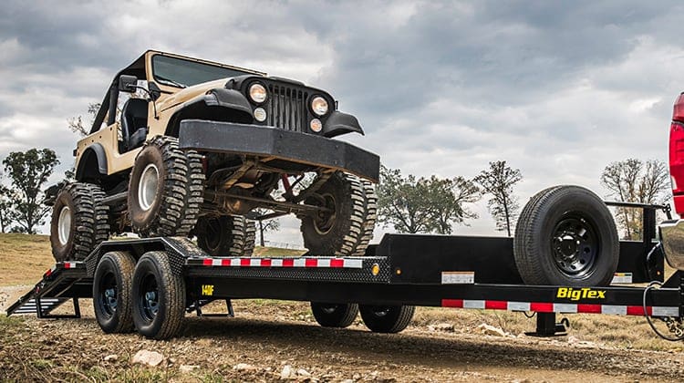 Super Wide Trailer Hauling Jeep